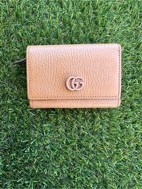 Gucci trifold wallet
